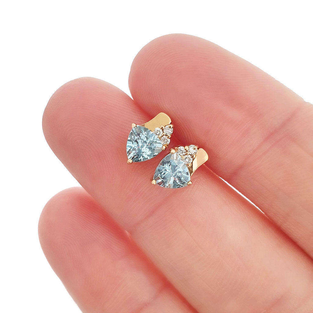 Aquamarine Trilliant Cut Studs with accent Diamonds