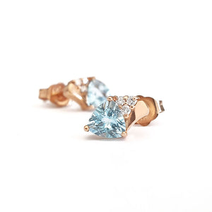 Aquamarine Trilliant Cut Studs with accent Diamonds