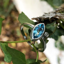 Bezel Set Marquise Cut Blue Topaz And Diamond Ring