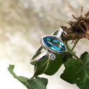 Bezel Set Marquise Cut Blue Topaz And Diamond Ring