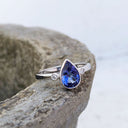 Bezel Set Pear Cut Tanzanite and Diamond Ring