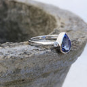 Bezel Set Pear Cut Tanzanite and Diamond Ring