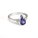 Bezel Set Pear Cut Tanzanite and Diamond Ring