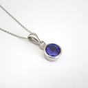 Bezel Set Round Cut Tanzanite and Diamond Pendant