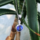 Bezel Set Round Cut Tanzanite and Diamond Pendant