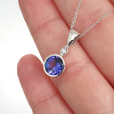 Bezel Set Round Cut Tanzanite and Diamond Pendant