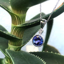 Bezel Set Round Cut Tanzanite and Diamond Pendant