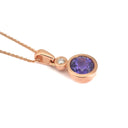 Bezel Set Tanzanite Round Cut and Accent Diamond Rose Gold Pendant