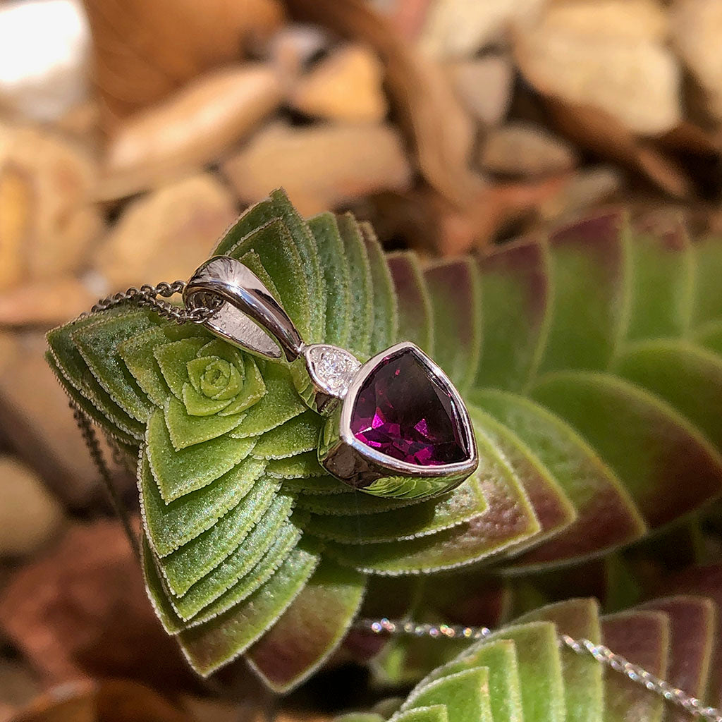 Bezel Set Trilliant Cut Grape Garnet and Diamond Pendant