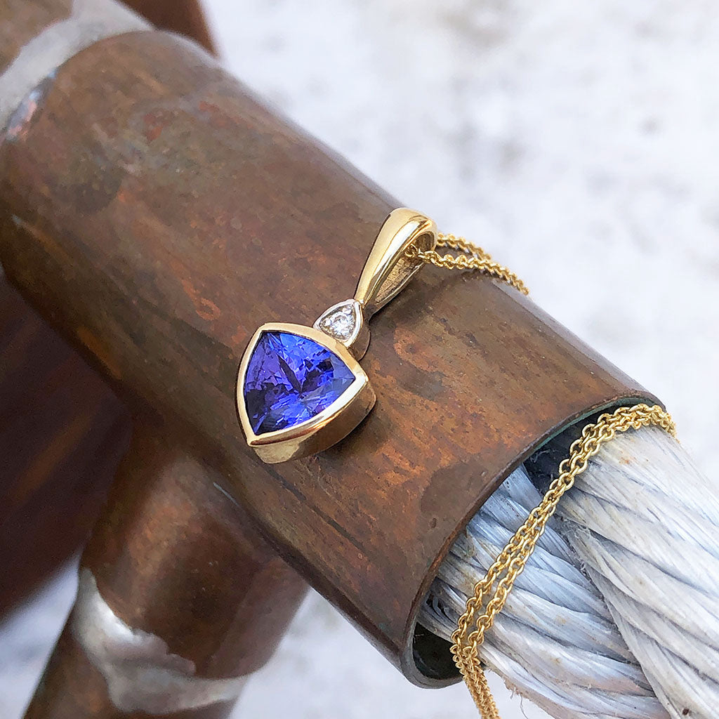 Bezel Set Trilliant Cut Tanzanite and Diamond Yellow Gold Pendant