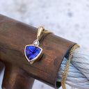 Bezel Set Trilliant Cut Tanzanite and Diamond Yellow Gold Pendant