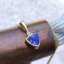 Bezel Set Trilliant Cut Tanzanite and Diamond Yellow Gold Pendant