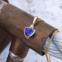 Bezel Set Trilliant Cut Tanzanite and Diamond Yellow Gold Pendant