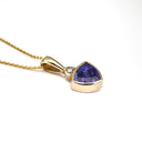 Bezel Set Trilliant Cut Tanzanite and Diamond Yellow Gold Pendant