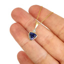 Bezel Set Trilliant Cut Tanzanite and Diamond Yellow Gold Pendant