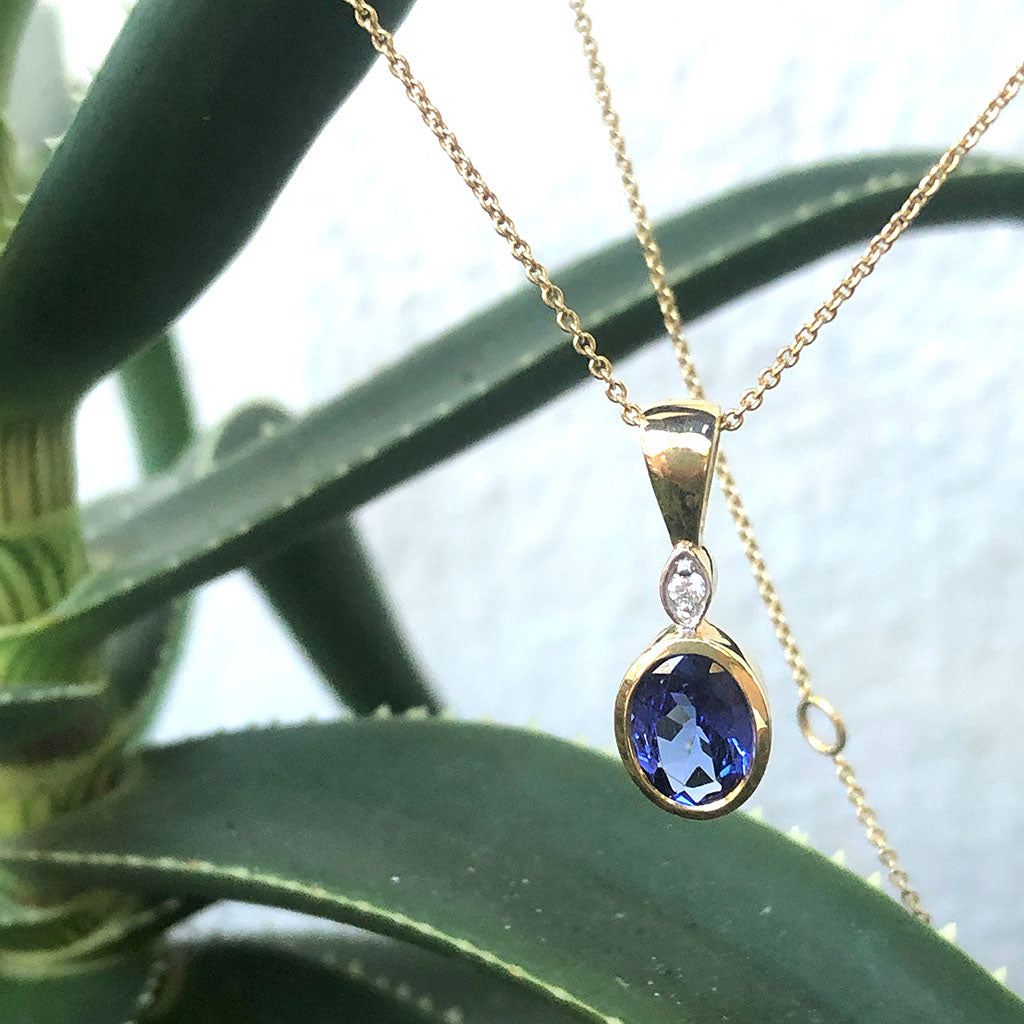 Bezel Setting Oval Tanzanite and Diamond Pendant