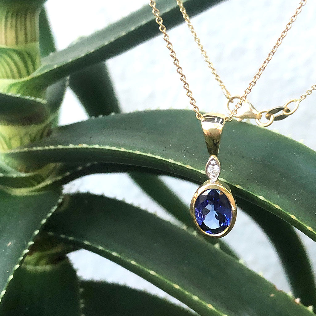 Bezel Setting Oval Tanzanite and Diamond Pendant