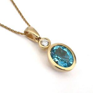 Blue Topaz, Diamond and Gold Pendant and Chain