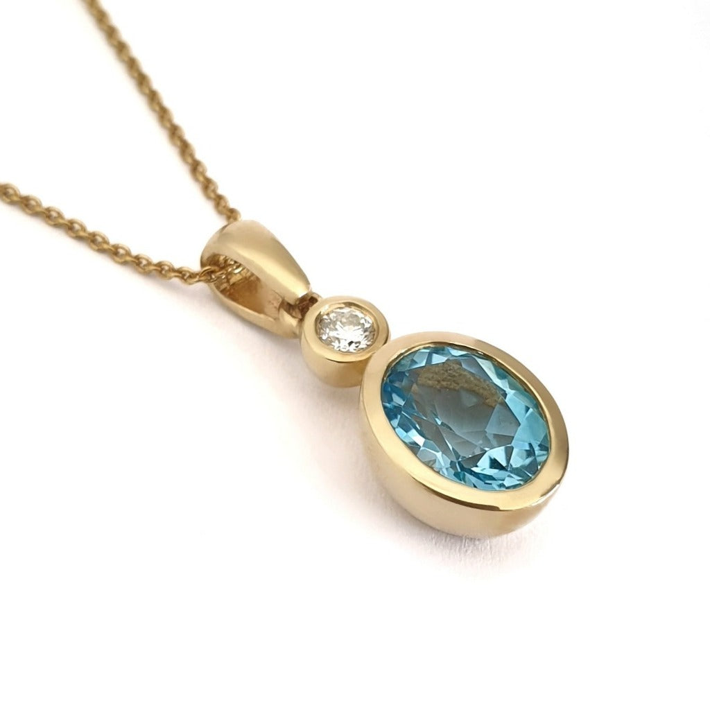 Blue Topaz, Diamond and Gold Pendant and Chain