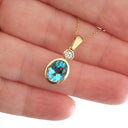 Blue Topaz, Diamond and Gold Pendant and Chain