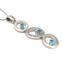 Blue Topaz and Diamond Circle Pendant