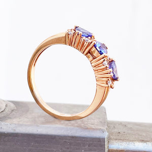 Breathtaking Three Trilliant Cut Tanzanite and Diamond Rose Gold Ring