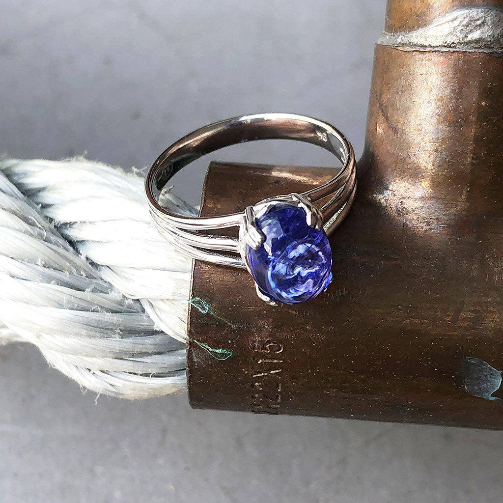 Cabuchon Oval Cut Tanzanite Three Band Shoulder Ring