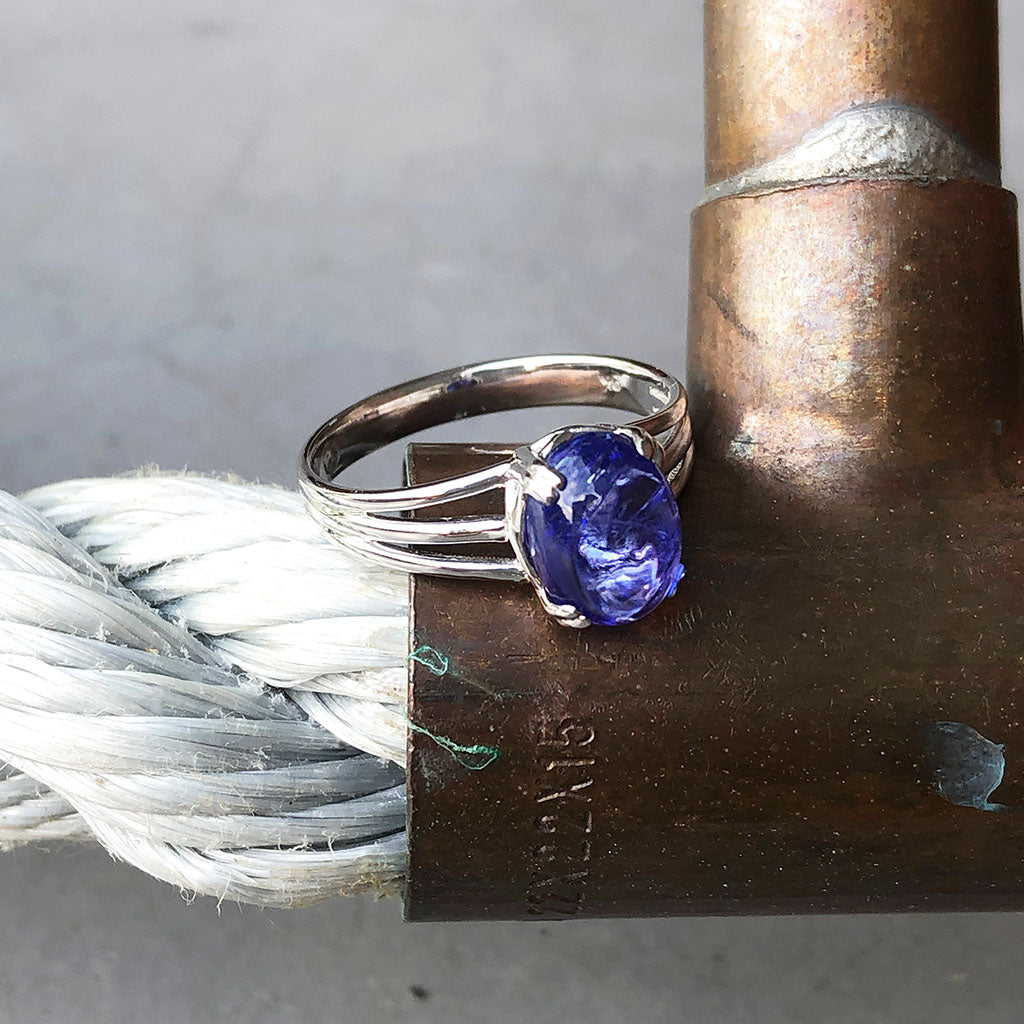 Cabuchon Oval Cut Tanzanite Three Band Shoulder Ring