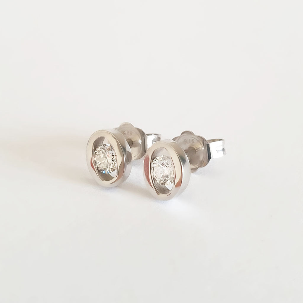 Channel Set Oval White Gold Diamond Earrings
