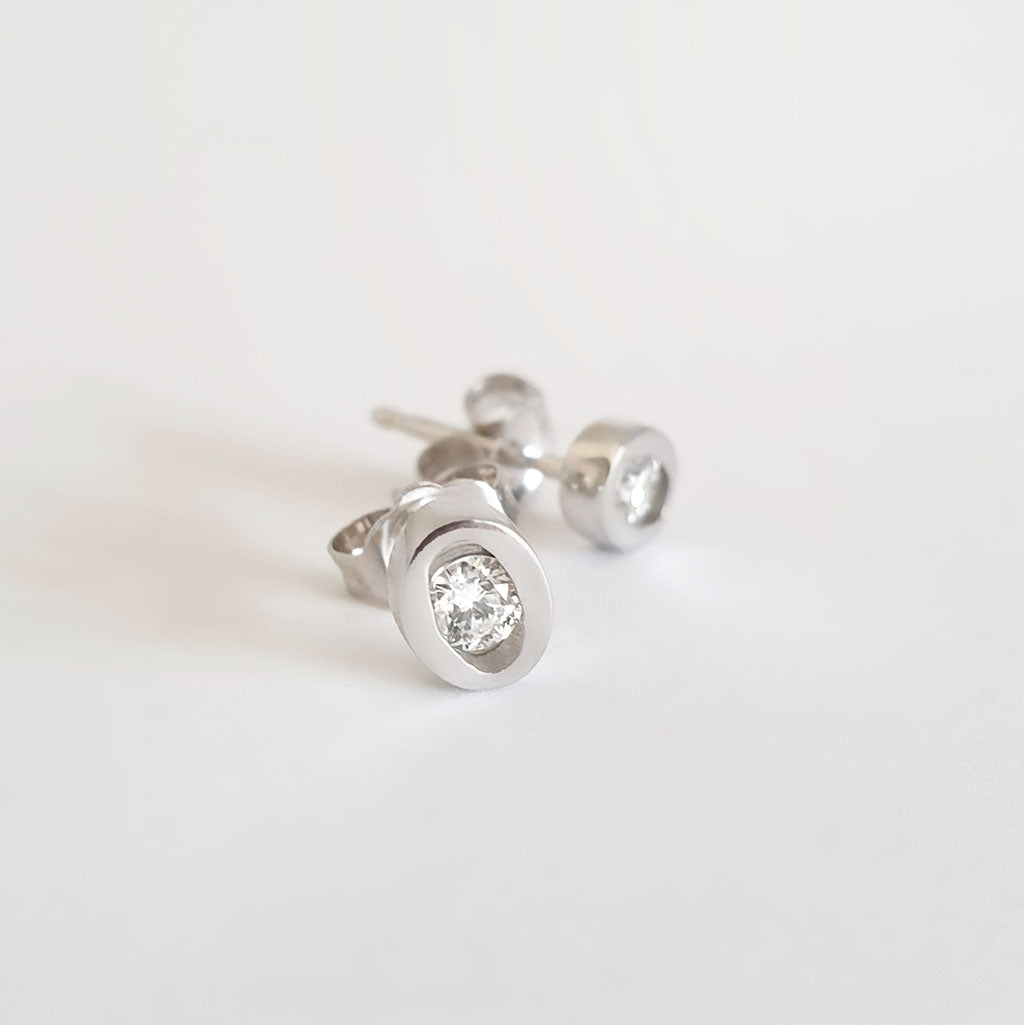 Channel Set Oval White Gold Diamond Earrings