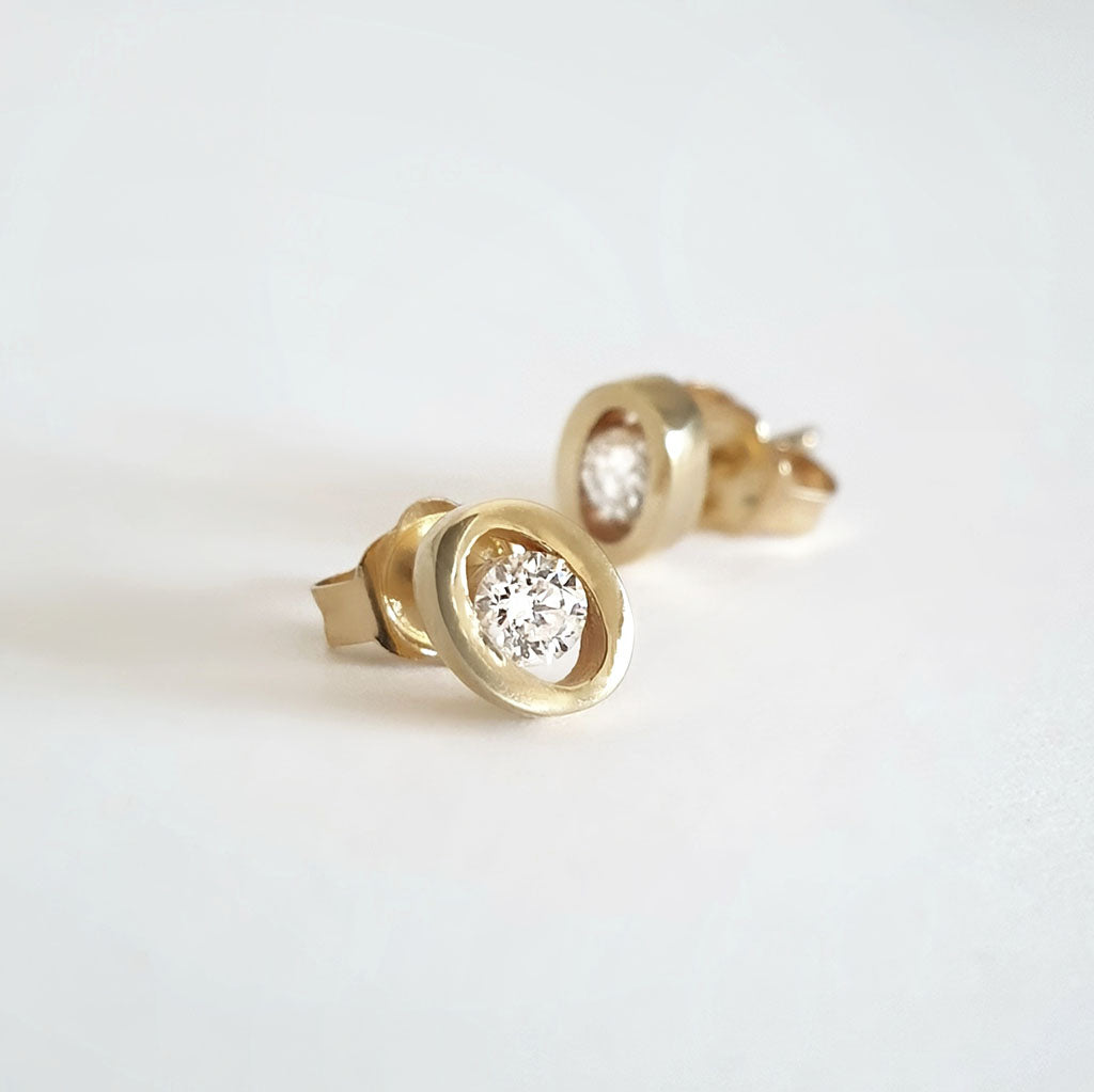 Channel Set Oval Yellow Gold Diamond Studs