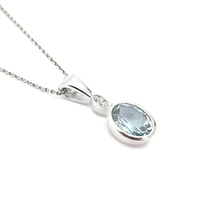  Charming Oval Bezel Set Aquamarine and Diamond Pendant