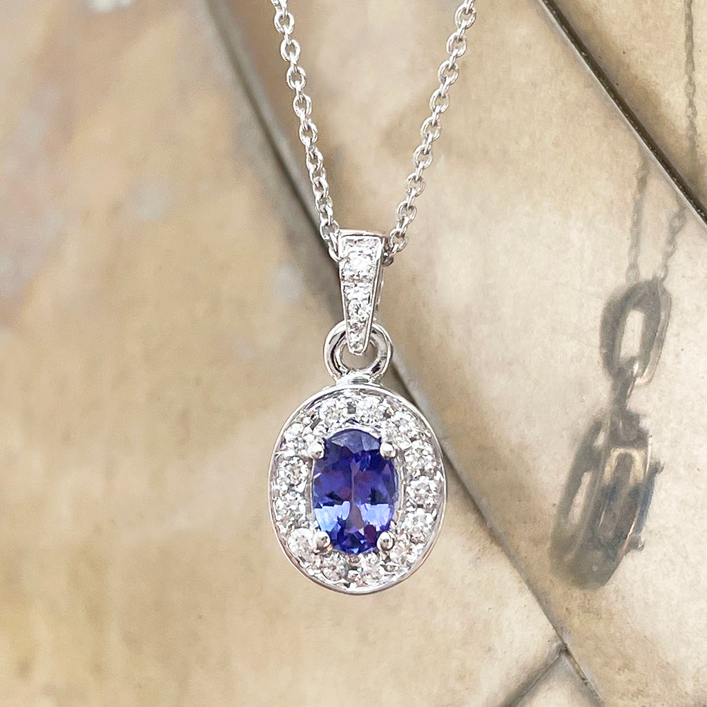 Classically Elegant Oval Tanzanite and Diamond Halo Pendant