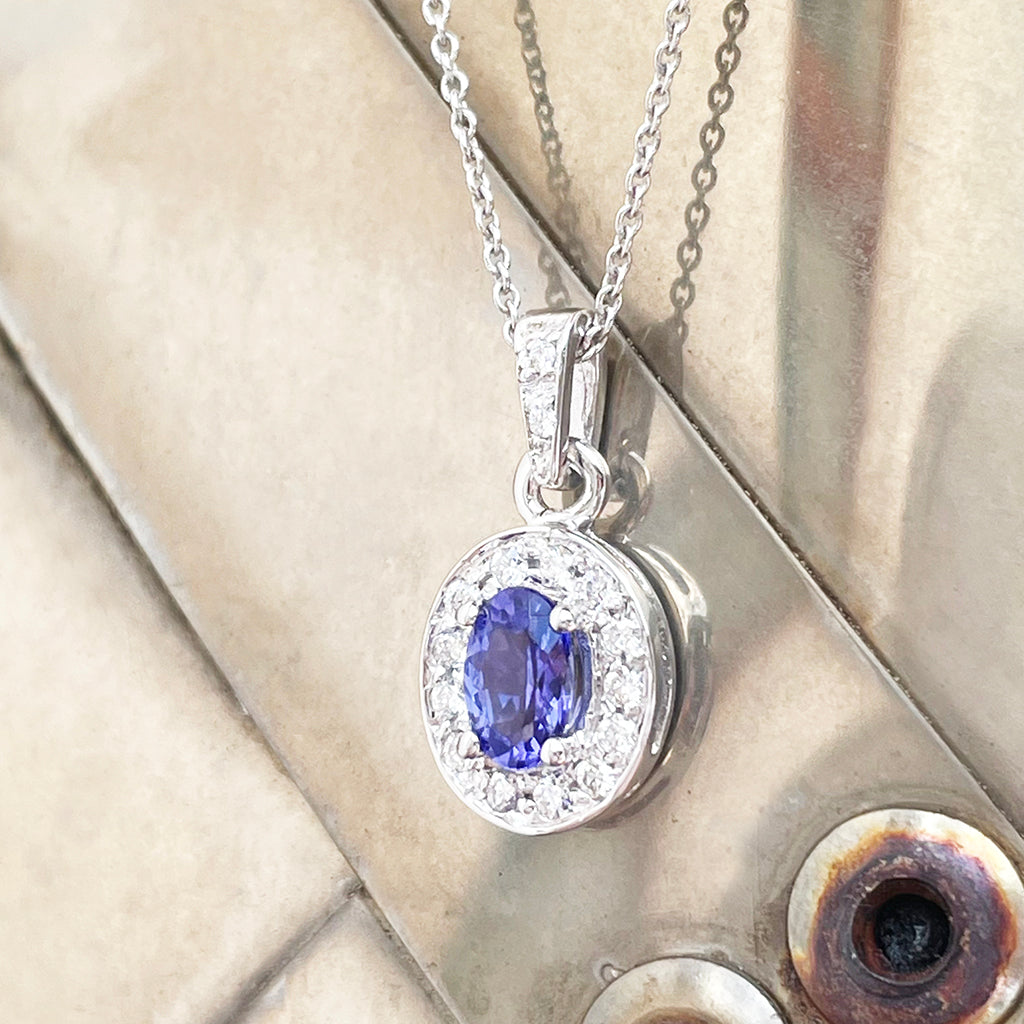 Classically Elegant Oval Tanzanite and Diamond Halo Pendant