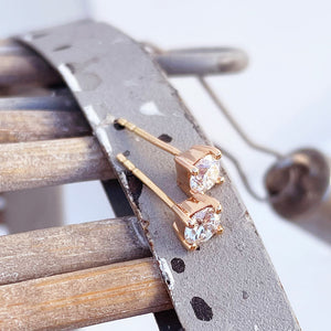 Classically Elegant White Diamond Rose Gold Studs