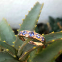 Contemporary Five Tanzanite and Four Diamond Rose Gold Ring