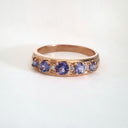 Contemporary Five Tanzanite and Four Diamond Rose Gold Ring