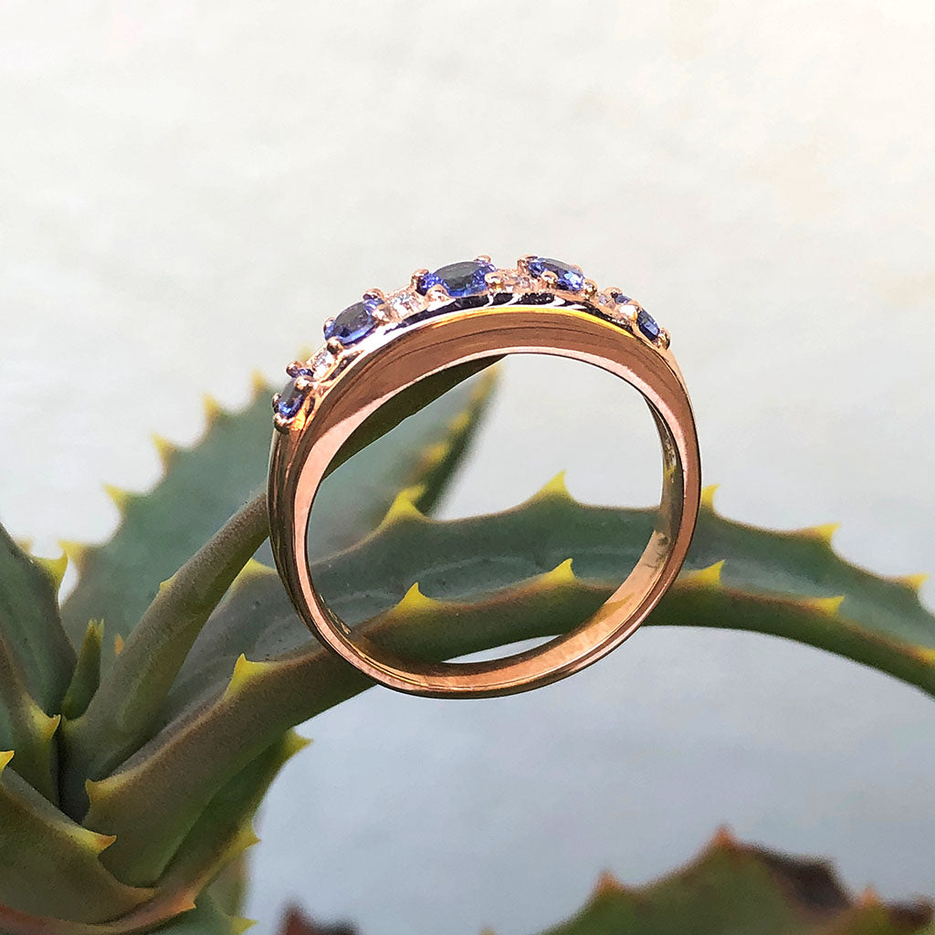 Contemporary Five Tanzanite and Four Diamond Rose Gold Ring