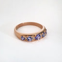 Contemporary Five Tanzanite and Four Diamond Rose Gold Ring