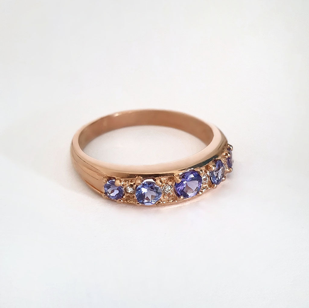 Contemporary Five Tanzanite and Four Diamond Rose Gold Ring