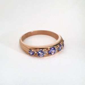 Contemporary Five Tanzanite and Four Diamond Rose Gold Ring