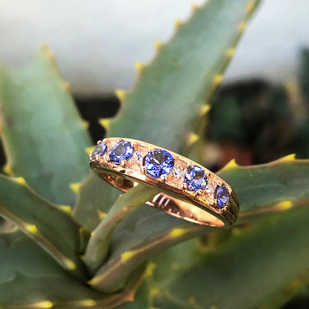 Contemporary Five Tanzanite and Four Diamond Rose Gold Ring