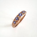 Contemporary Five Tanzanite and Four Diamond Rose Gold Ring