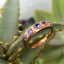 Contemporary Five Tanzanite and Four Diamond Rose Gold Ring