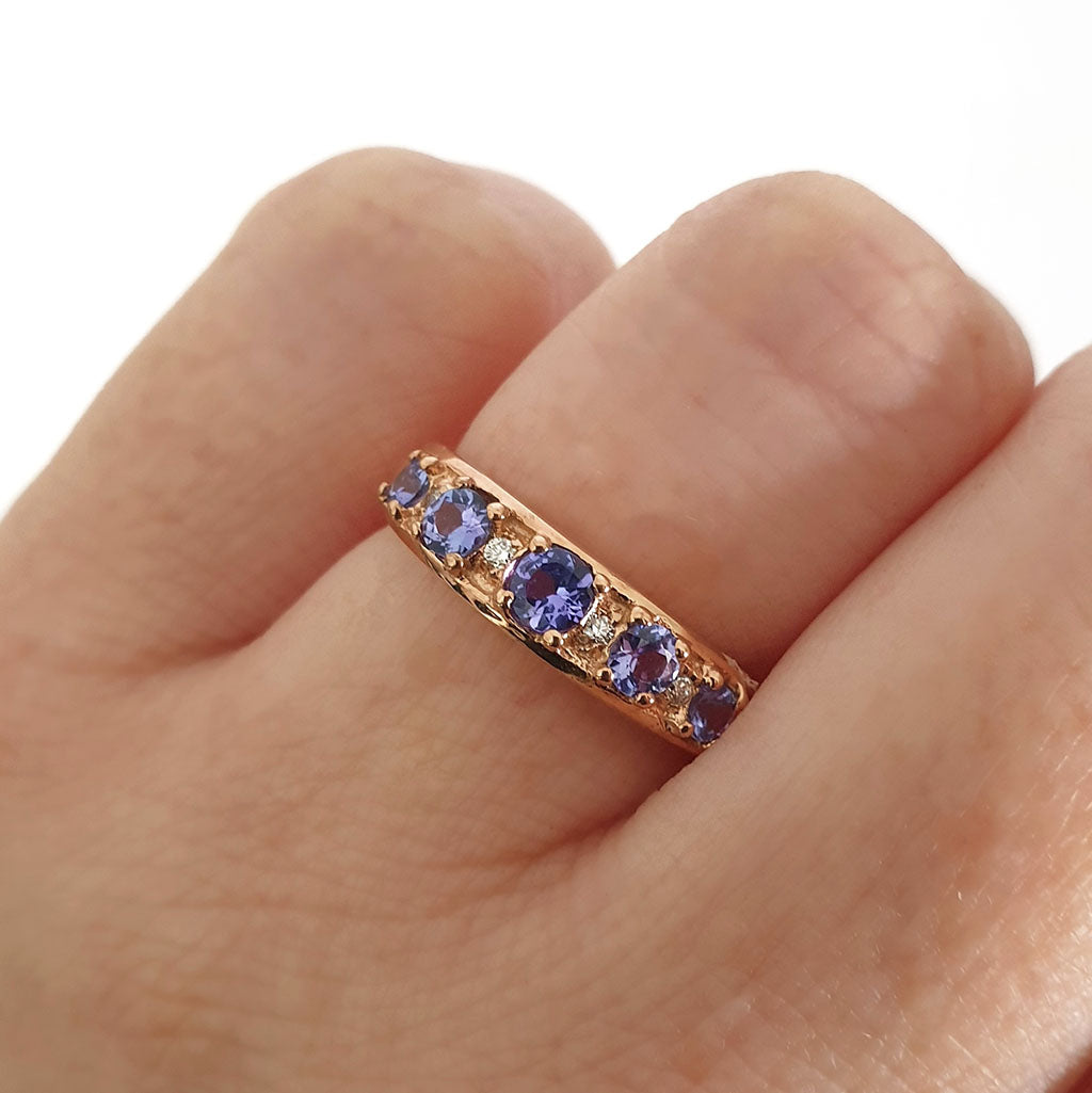 Contemporary Five Tanzanite and Four Diamond Rose Gold Ring