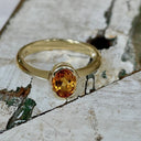 Contemporary Oval Citrine Yellow Gold Open Bezel Set Ring