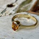 Contemporary Oval Citrine Yellow Gold Open Bezel Set Ring