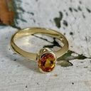 Contemporary Oval Citrine Yellow Gold Open Bezel Set Ring
