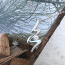 Contemporary Winding Diamond Pendant 