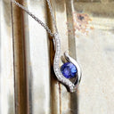 Curvaceous Tanzanite and Diamond Pendant
